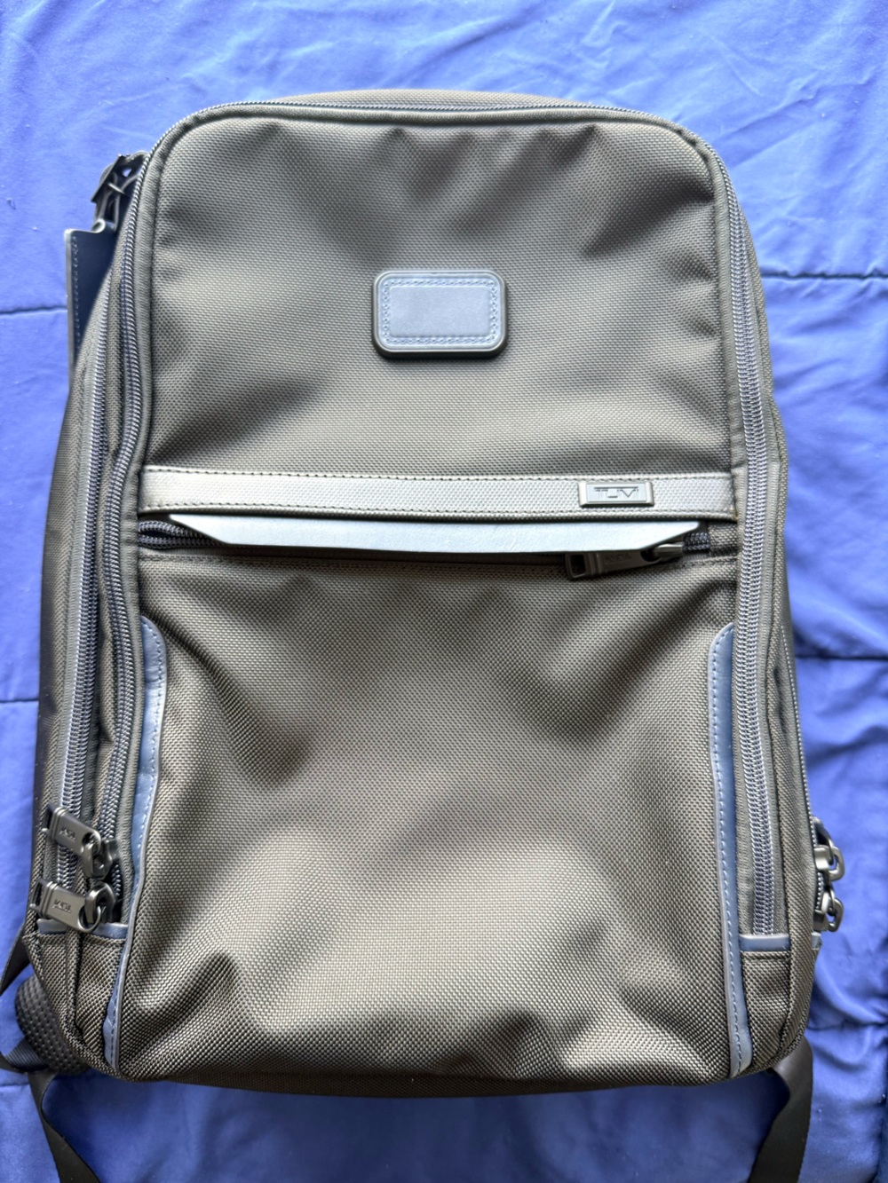 Tumi Black Bag with Red Limited-Edition Tag